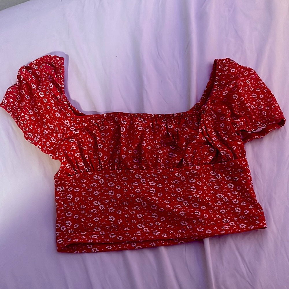 Red shirt with floral design